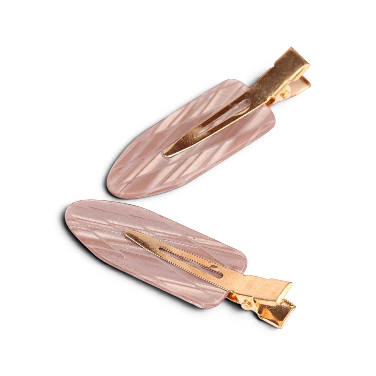 Pair of pink acrylic resin hair clips with gold-tone metal clasps and textured surface