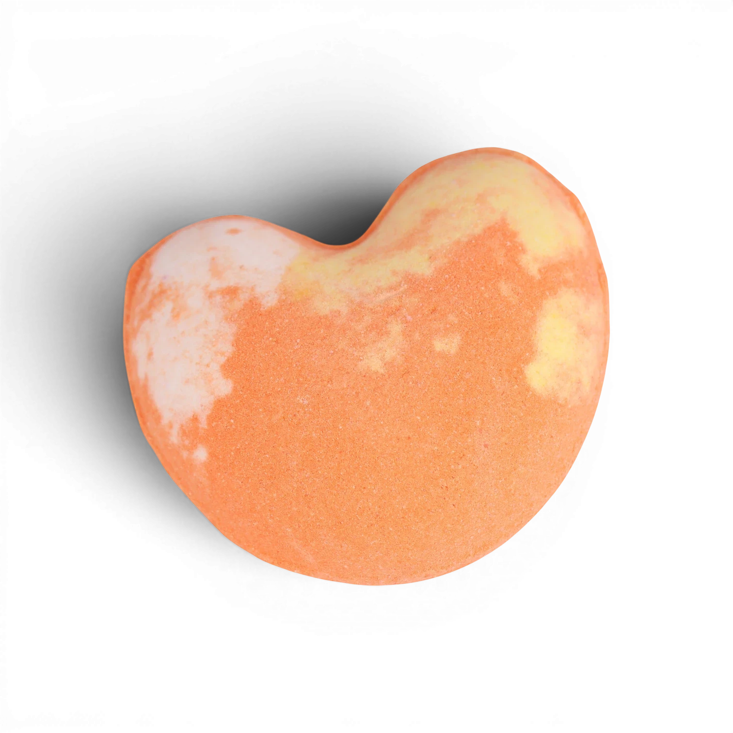 Coral-orange heart-shaped bath bomb with creamy swirls and shimmering finish