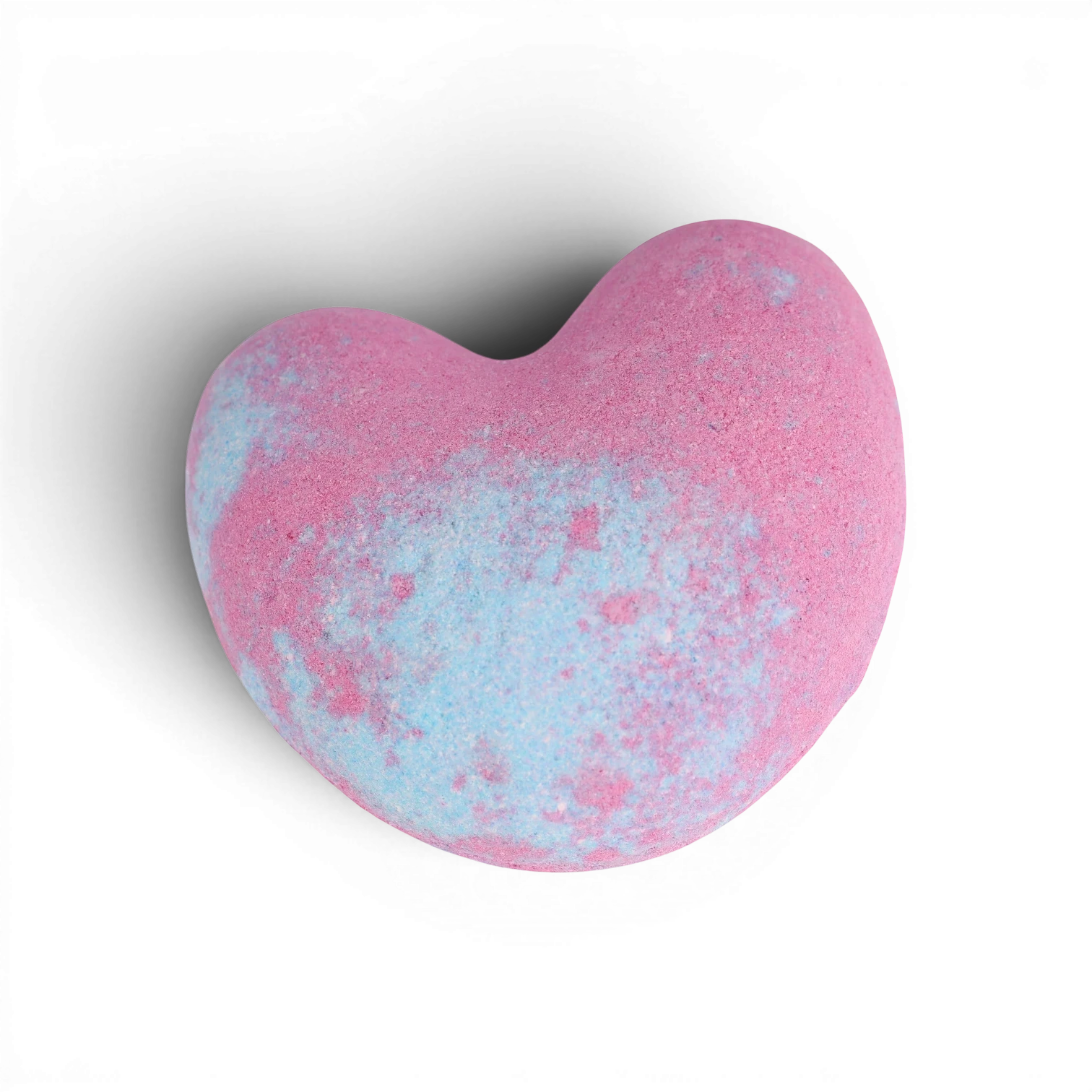 Pink and blue heart-shaped bath bomb with fizzy texture and swirled color pattern