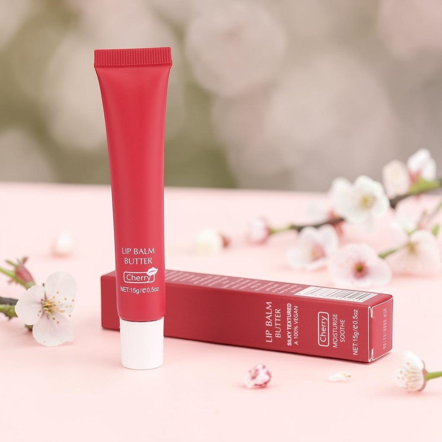 Boxigami bálsamo labial con aceite tintado de cereza en tubo exprimible, fórmula vegana con manteca y extracto de fruta para un brillo luminoso y no pegajoso.