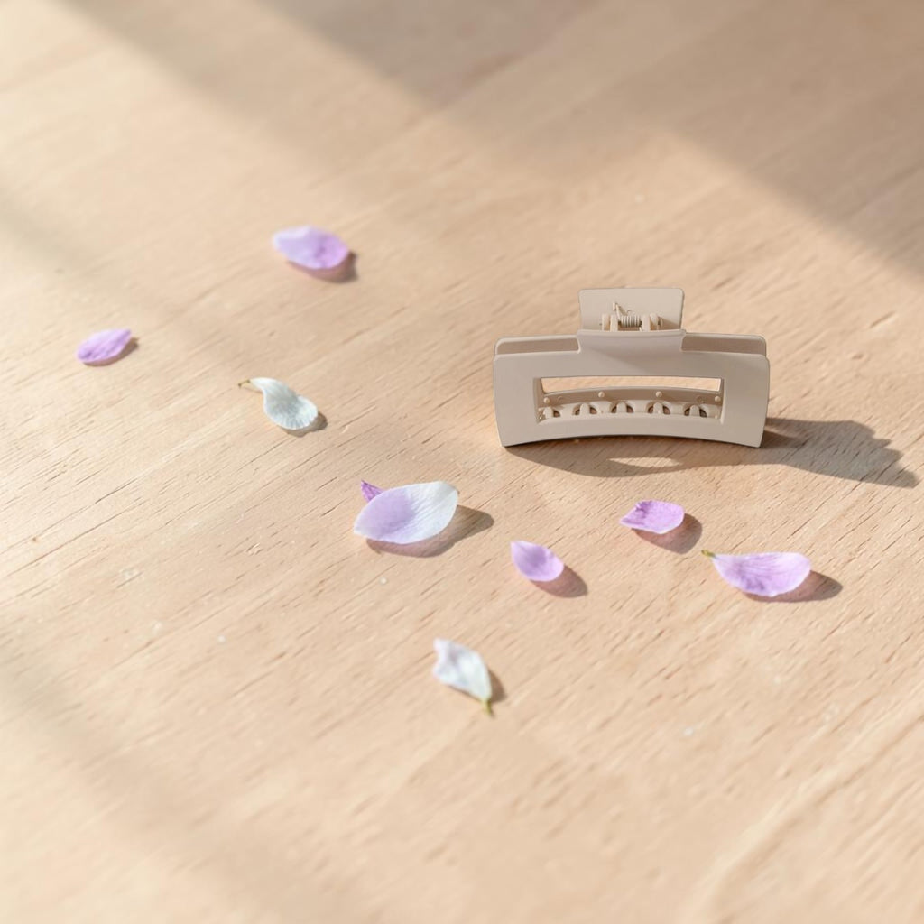 Boxigami beige rectangular claw clip with a matte finish and strong spring-loaded jaw for secure styling.