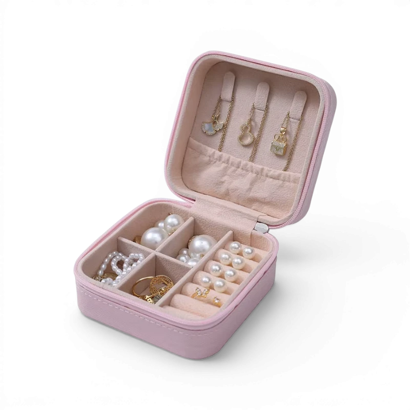 Boxigami caja de joyería de cuero rosa con interior forrado de terciopelo, ideal para viajes y almacenamiento.