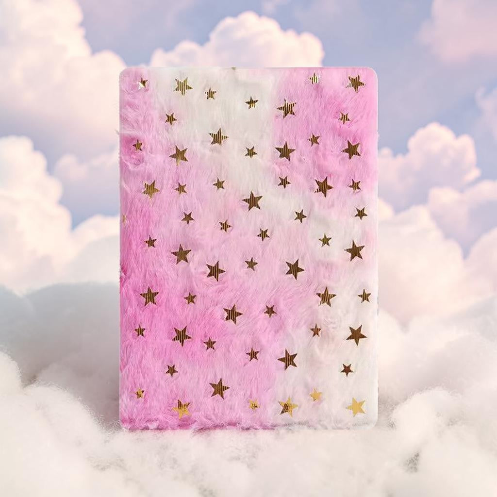Cuaderno Boxigami con cubierta de felpa rosa y blanca con estrellas doradas. Páginas forradas para escritura diaria.