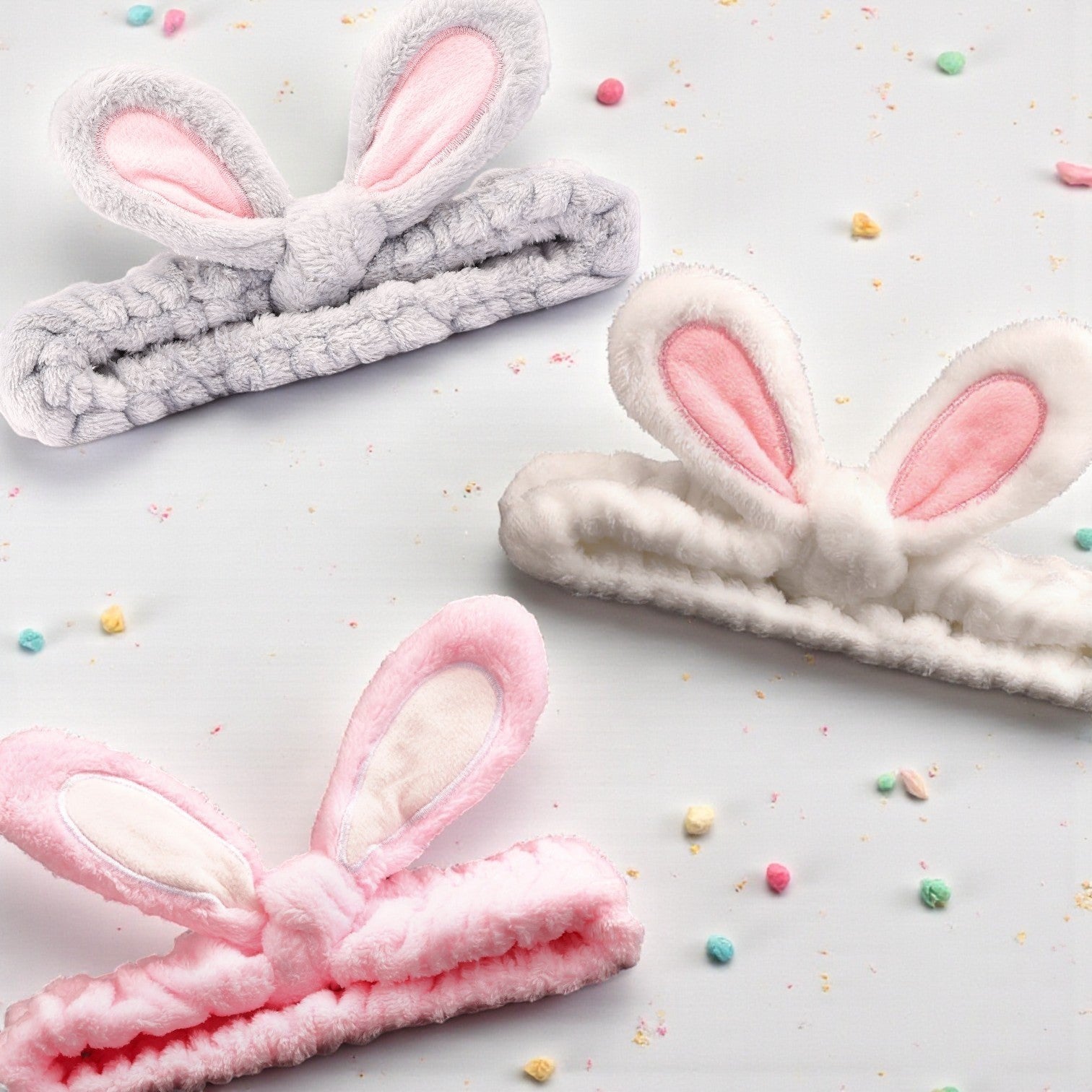 Boxigami diadema de felpa rosa con orejas de conejo, ideal para rutinas de maquillaje y cuidado de la piel.