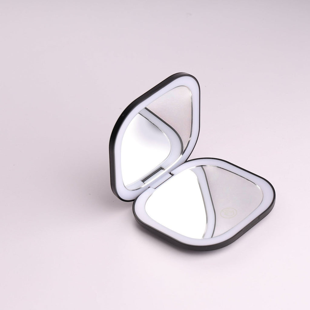 Espejo de maquillaje compacto Boxigami con LED, plegable y recargable por USB, con iluminación ambiental.
