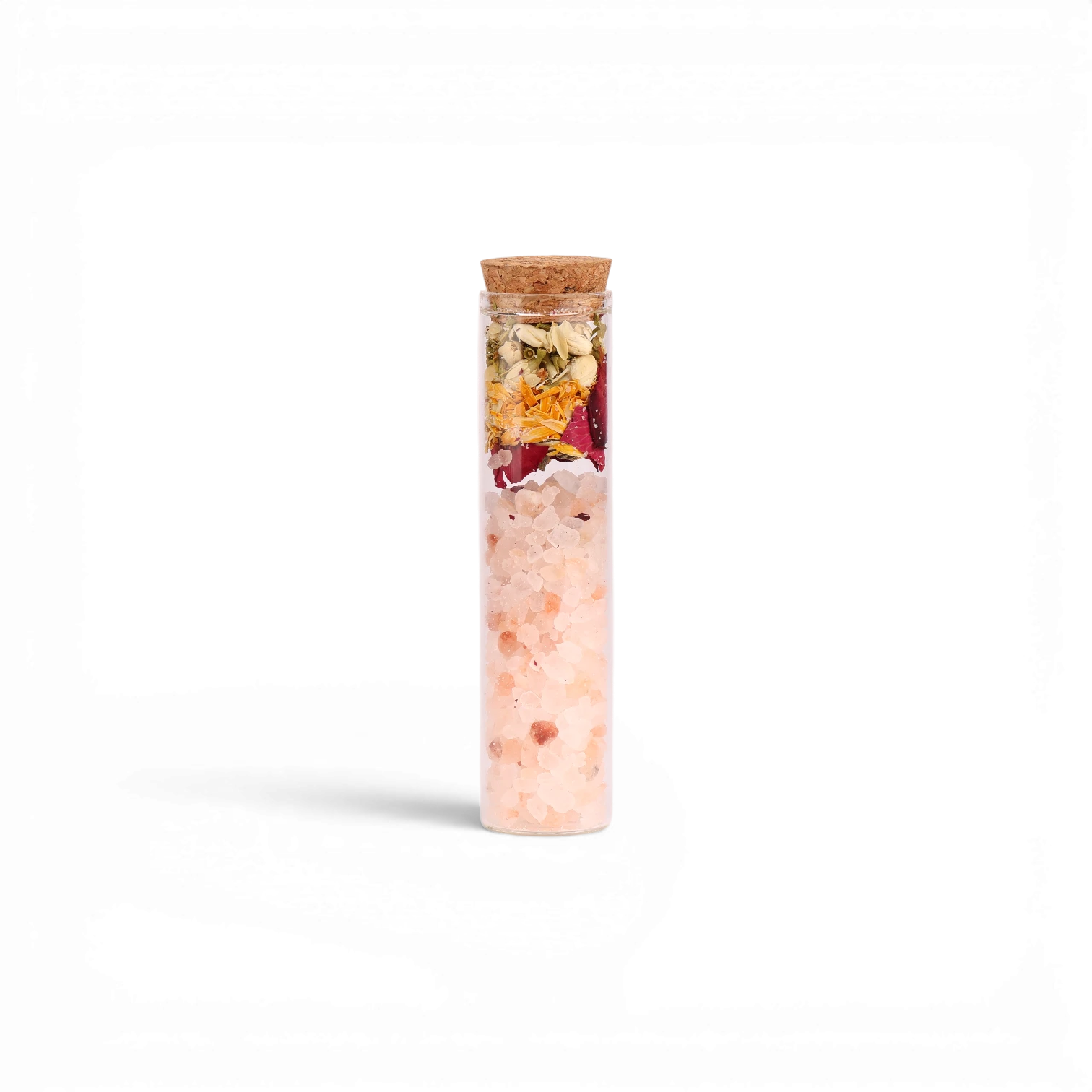 Sales de baño Boxigami de sal del Himalaya con flores secas en un vial de vidrio con corcho. Sal rosa y pétalos de rosa.